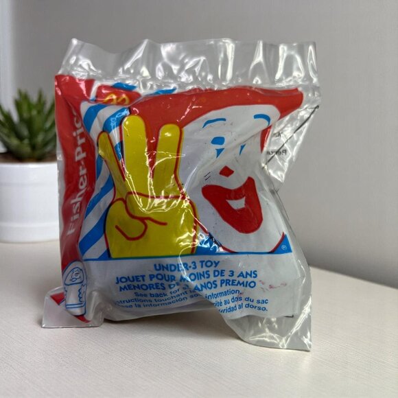 Vintage Fisher Price Purple Ball Rattle McDonalds Toy, Sealed Package 1996 - Picture 1 of 5